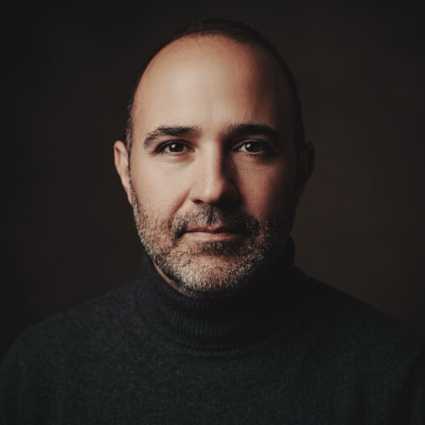 ORBYX Instrumental Composer – Profile of the artist at the piano creating cinematic soundtracks.